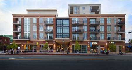 ©Mark Lamkin Photography. The 140 West Franklin development in Chapel Hill, North Carolina, designed by Cline Design, includes 140 luxury condominiums with 35,000 square feet (3,300 sq m) of ground-floor retail space and two stories of below-grade parking. The development, completed in 2013 as one of the first condo projects in the region following the 2008 economic downturn, was planned to meet the city’s sustainability guidelines.