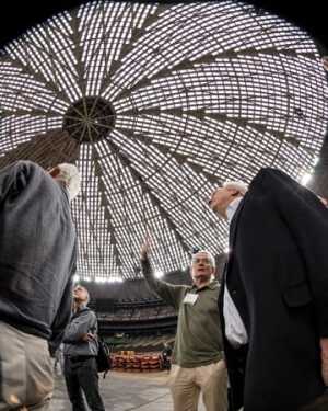 Panelists and stakeholders touring the Astrodome. From Left: Peter Hasselman, an architect and urban designer in Orinda, California; Todd Mead, a senior associate at PWP Landscape Architecture in Berkeley, California; Tom Murphy, former Pittsburgh mayor and ULI senior resident fellow; and Mark Miller, general manager of NRG Park.