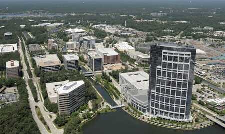 The Woodlands development includes 7 million square feet (650,000 sq m) of office space. 