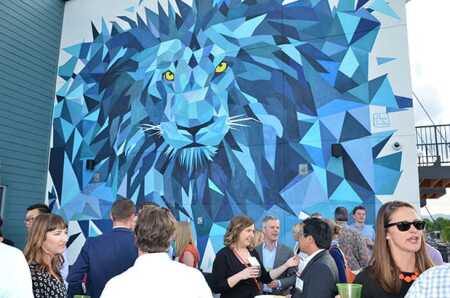 Attendees at a ULI Colorado event network on the roof deck of the West Line Flats building in Lakewood, Colorado. (Tari Ensign/ULI Colorado)