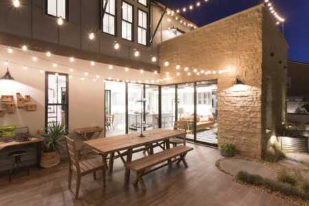 With no garage, yardspace is dedicated to entertaining. There is also an adjacent in-law suite to rear with a separate entrance for a roommate or visiting relative. (TRI Point/Pardee Homes)