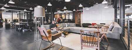 Coworking provider WeWork offers this shared open office in Washington, D.C., where solo entrepreneurs, professionals, and employees of startup companies can rent desk space. (Photos Courtesy of WeWork)