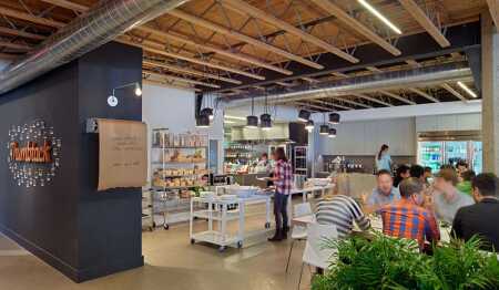 ©Bruce Damonte. Equipped with a full commercial kitchen, Thumbtack’s large dining area accommodates all-hands gatherings and provides workspace throughout the day.
