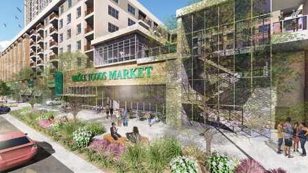 ©Landdesign. Crescent Communities’ mixed-use development Stonewall Station, designed by the Preston Partnership in collaboration with LandDesign, is under construction in a historically underpopulated area of Uptown Charlotte. The project includes a 12-story, 115-unit multifamily structure and a five-story, 330-unit apartment building, plus a vertically integrated Whole Foods Market and 15,000 square feet (1,400 sq m) of retail space—all one block from the LYNX Blue Line light rail.