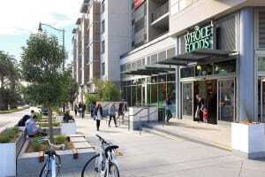 Situated on a oddly shaped 0.72-acre (0.29 ha) parcel, the Prado Group’s 38 Dolores development in San Francisco includes an eight-story mixed-use building with 81 luxury rental condominiums above a 30,000-square-foot (2,800 sq m) Whole Foods Market. Working with BAR Architects, the Prado Group transformed an underused urban site into a high-density mixed-use project. Certified LEED Gold, the project incorporates high-quality high-rise construction with environmentally sensitive materials. (©Doug Dun/BAR Architects) 