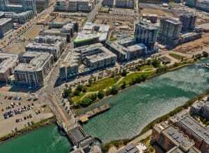 An aerial view of Mission Bay South with the 1180 Fourth Street development along Channel Park. (Steve Proehl)