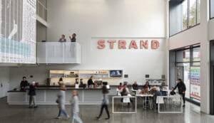 © Skidmore, Owings & Merrill LLP | Bruce Damonte, 2016. All rights reserved. When the theaters are dark, the building remains open to the public as a café and community gathering space. The familiar metal-framed pink-neon letters from the cinema’s marquee, originally installed in 1959, were salvaged, restored, and incorporated into the design of the café.