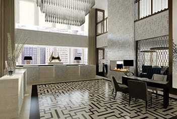 The reception area of the Langham Hotel Chicago  reflects the building’s midcentury modernist architecture. (©oxford capital group)