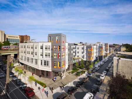 Paseo Verde combines low- and moderate-income housing, plus medical retail and office uses, within a LEED ND Platinum and LEED for Homes Platinum development adjacent to rail transit. (Halkin Mason Photography)