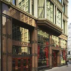 The lavishly restored 14-story Hotel Burnham, one of four boutique hotels in Chicago operated by Kimpton Hotels, occupies one of the city’s first skyscapers, the 1894 Reliance Building. Below: The hotel’s Reliance Room.