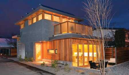 Rising property values and taxes, along with changing demographics, have stimulated growth in PAD demand in both cities and suburbs. One of the first solar laneway house PADs in suburban Vancouver, British Columbia, was built by Lanefab Design/Build as an infill on an existing 50-foot-by-125-foot (15 by 38 m) residential lot. It is 1,050 square feet (98 sq m) with one bedroom and two bathrooms built for the owners of the existing main house. (Lanefab Design/Build)