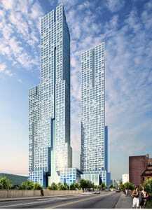 The 53-story, 538-unit luxury multifamily building, Journal Squared, began construction in January 2014. The project is a partnership between KRE Group and National Real Estate Advisors. The structure, designed by HWKN and Handel Architects, is expected to be completed in mid-2016.  It is located directly adjacent to the Journal Square PATH station in Jersey City. (HWKN and Handel Architects)