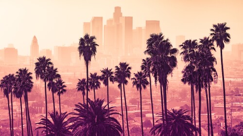 Los,Angeles,Skyline,With,Palm,Trees,In,The,Foreground