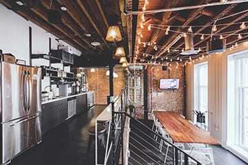 WeWork’s office space includes a kitchen and coffee bar—and a beer keg. (Photo Courtesy of WeWork)