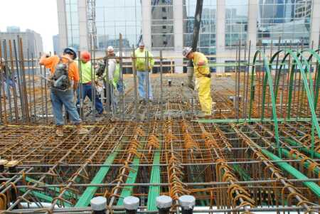 The repurposing of the project involved reworking the 27 stories of the concrete-and-steel structure already built and adding a new structure to bring the building to a total of 60 stories when finished.