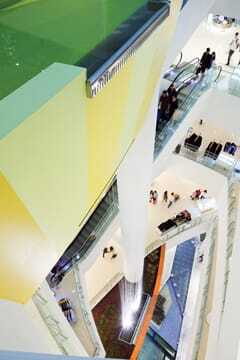 A waterfall descends through  a building’s interior. (Hiroyuki Kawano)