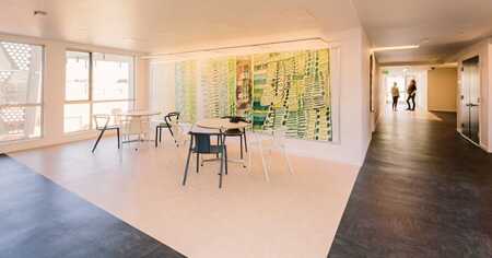 Ideal corridors have natural light, colorful artwork, views, and places to gather. (©matt edge)