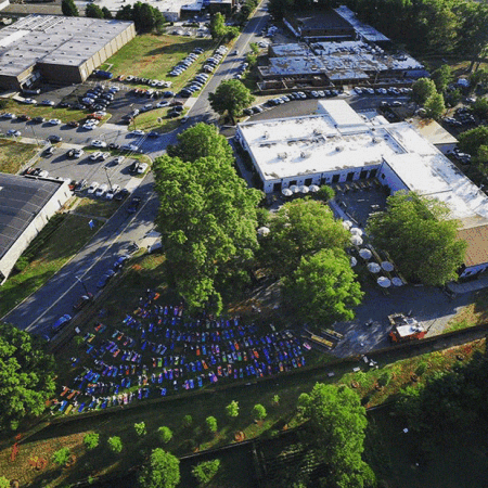 On the lower left, an outdoor yoga class is held on the Olde Mecklenburg Brewery's