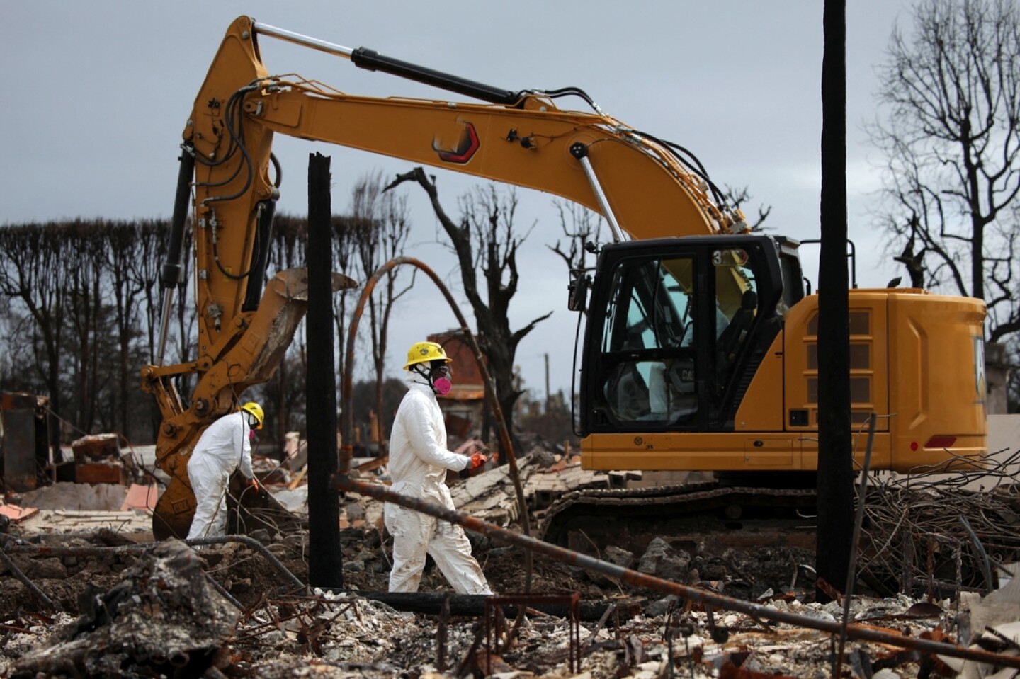 U.s.,Army,Corps,Of,Engineer,Contractors,Are,Seen,Removing,Debris