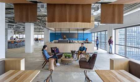 ©Jasper Sanidad. For Yelp’s offices on Hawthorne Street in San Francisco, Studio O+A created a sense of intimacy by incorporating used furniture, felt canopies, and a coffee bar.