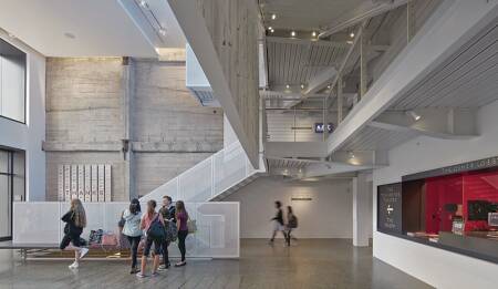 © Skidmore, Owings & Merrill LLP | Bruce Damonte, 2016. All rights reserved.The design of the lobby was inspired by multistory theatrical sets and creates a dramatic space. While the ground floor, stairs, and balconies establish sight lines allowing people to see and be seen both within the building and by passersby, the LED screen establishes a “backstage” for more private interactions.