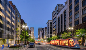 Neighborhood multifamily development in Detroit is accelerating thanks to the expected launch this year of the QLINE streetcar system, owned and operated by M-1 Rail, which will run from downtown through Midtown, New Center, and the North End. The QLINE is projected to generate $3 billion in development, including 10,000 new housing units and 5 million square feet (465,000 sq m) of new commercial space within ten years. To date, $1.3 billion in projects have been completed or are under construction. An additional $275 million in development is also underway. (DETROIT DOWNTOWN DEVELOPMENT AUTHORITY)