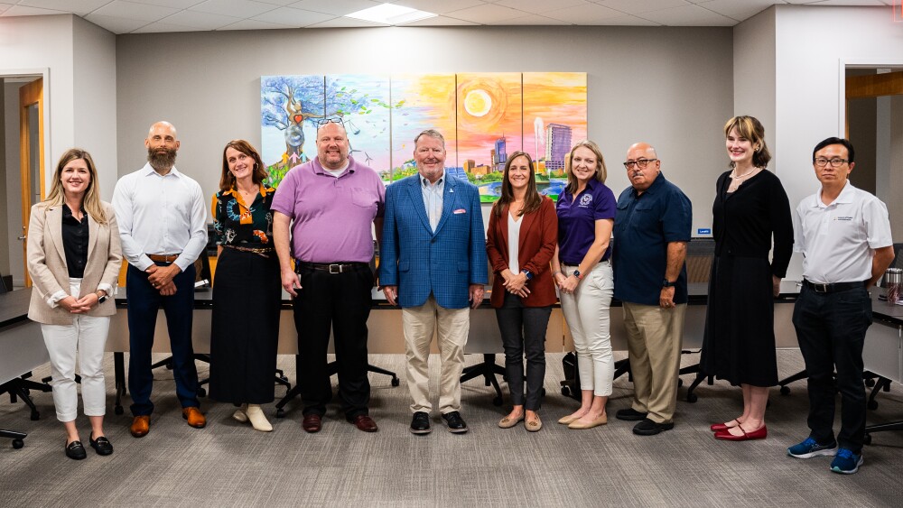 4_Orlando Mayor Buddy Dyer and the REACH Hub Team.jpg