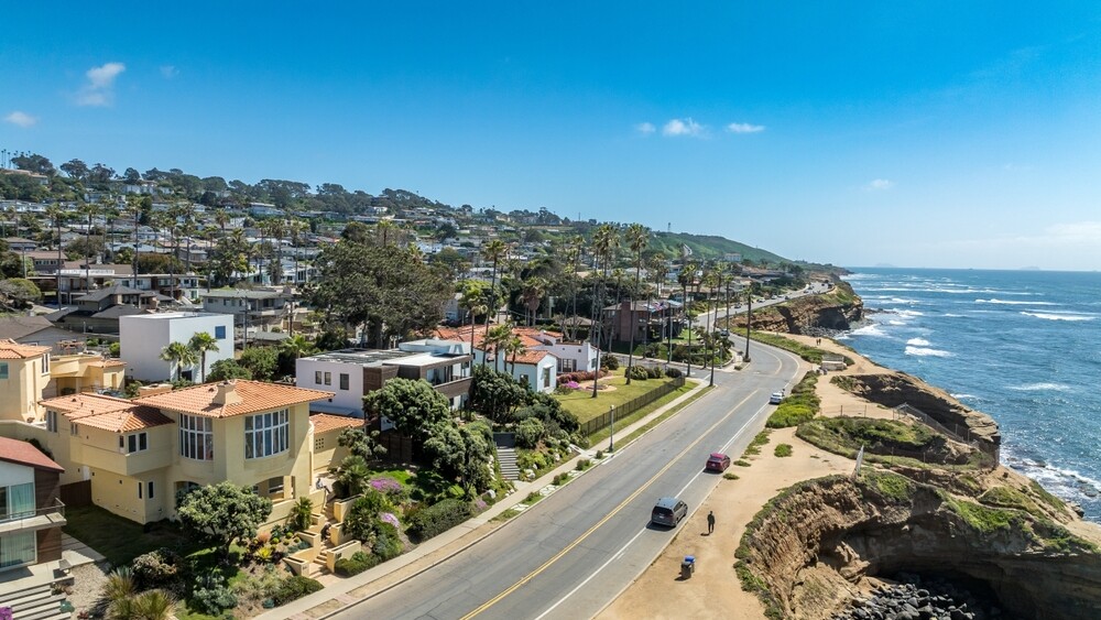 Aerial,View,Of,Hillside,Luxury,Single,Family,Homes,Above,Sunset