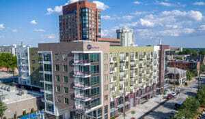 ©Sterling E. Stevens Design Photo. Grubb Properties’ 203-unit Link Greenwood multifamily development, located in the Glenwood South entertainment district near downtown Raleigh, was completed in spring 2016. It was built at a 1.3-acre (0.5 ha) infill site that included a one-story, 5,000-square-foot (465 sq m) building.