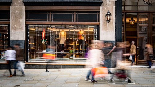 Motion,Blurred,People,On,Busy,Shopping,Street