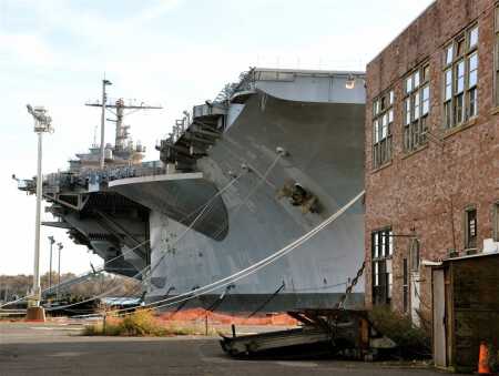 Retired Navy ships, including the USS John F. Kennedy aircraft carrier, lend a unique character. (PIDC)