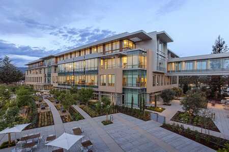 Form4 Architecture designed two buildings totaling 241,000 square feet (22,390 sq m) for Netflix in Los Gatos, California. The two structures for developer Sand Hill Property are connected by a slender mid-air bridge that allows free flow between buildings. (Frank Perez)