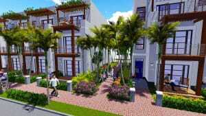 A shared space between the two groups of townhouses facilitates access to the flexible units while providing a play space for children. (Mark Schrieber)