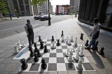 Public art and games such as this giant chess set on Michigan Avenue inject whimsy and spontaneity into Detroit’s efforts at place making.