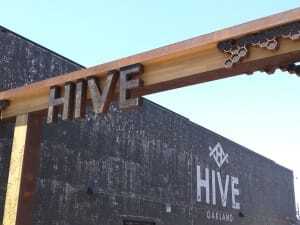 The gateway to the Hive, which converted a city block of historic structures in Oakland’s Uptown district to provide a mix of housing, retail space, and office space. (©Signature Development)