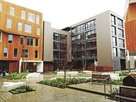 With the courtyard park, the development team created an instant place that would identify the building complex and create an amenity for tenants. Developer Ben Kaiser’s offices are on the third floor overlooking the new Portland pocket park. (Kaiser Group)